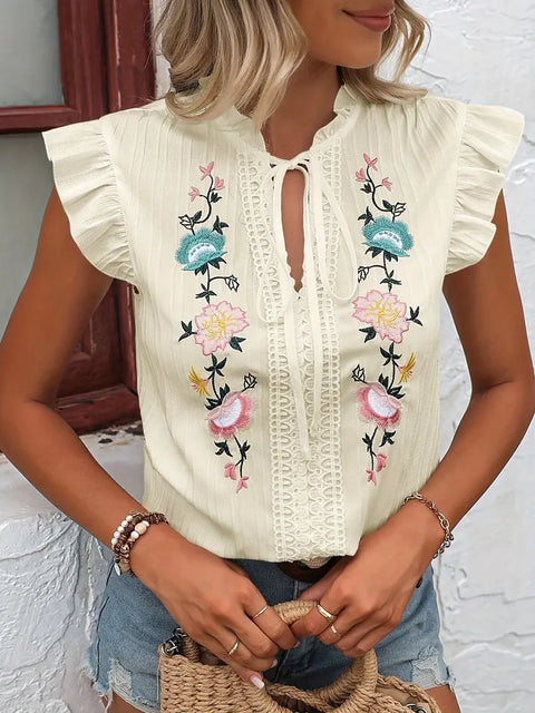 Louvica - Elegante Bluse mit Blumenstickerei und Rüschenärmeln